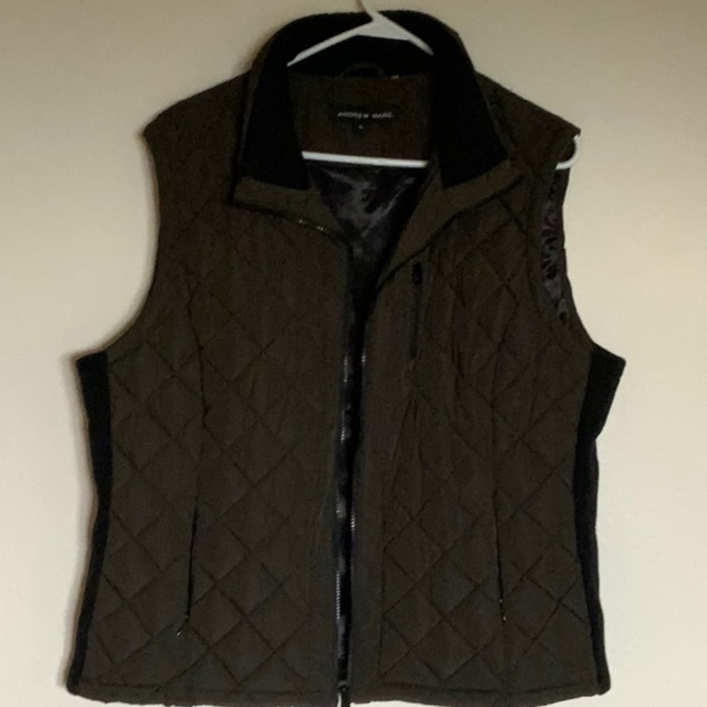 Andrew Marc quilted green vest with black trim. Size XL